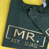 Mr. & Mrs EST Personalized gold print on T-shirt.