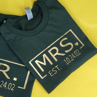 Mr. & Mrs EST Personalized gold print on T-shirt.
